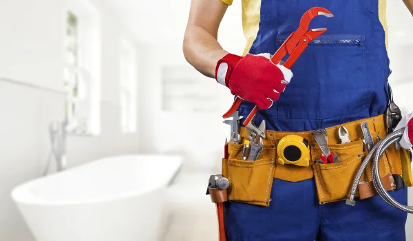 the torso of a plumbing technician showing a tool belt from Emergency Plumber Kyle in Kyle, TX - Residential Plumbing Services the torso of a plumbing technician showing a tool belt from Emergency Plumber Kyle in Kyle, TX - Residential Plumbing Services